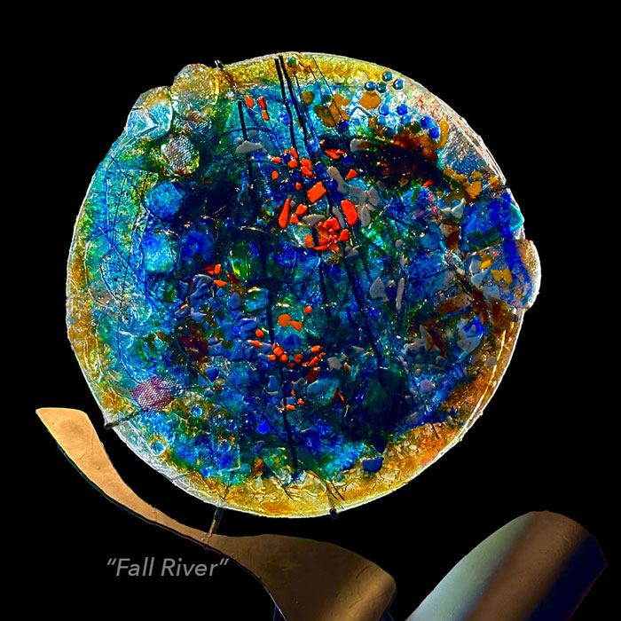 Glass sculpture, on a cutom steel base titled "Fall River"