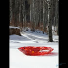 Kiln formed red glass bowl titled "Red Zen Bown"