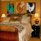 Three rooster paintings